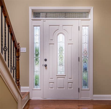 The height of a <b>front</b> <b>door</b> usually stands at 80 inches, with an additional 1-2 inches for the jamb, adding up to a total of 82 inches in height for the rough opening. . Front door with sidelights and transom home depot